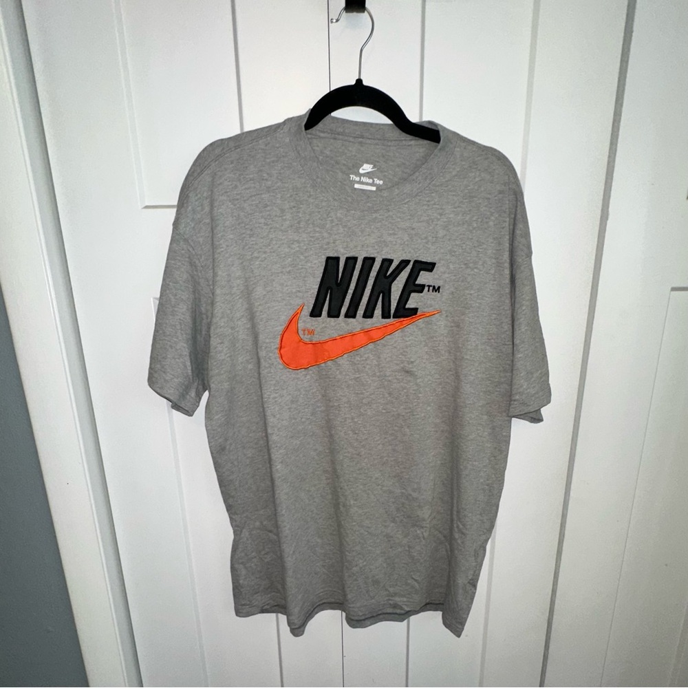 Nike Men's Heather Gray Tee with Vibrant Orange Swoosh